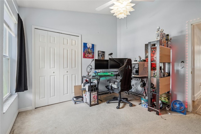 carpeted office with ceiling fan and lofted ceiling