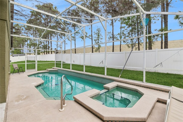 view of pool featuring an in ground hot tub, a patio, a lawn, and a lanai