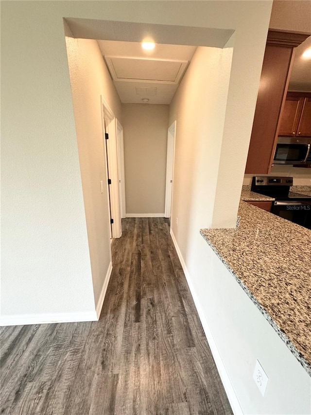 hall featuring dark hardwood / wood-style flooring