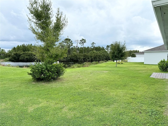 view of yard with a water view