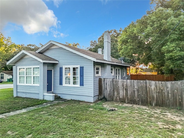 exterior space featuring a lawn