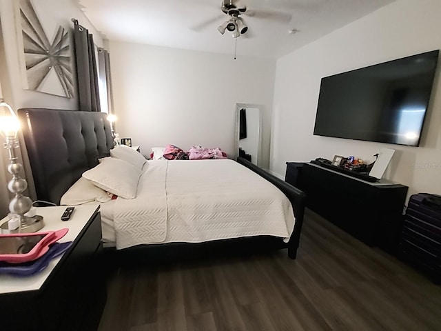 bedroom with ceiling fan and hardwood / wood-style flooring