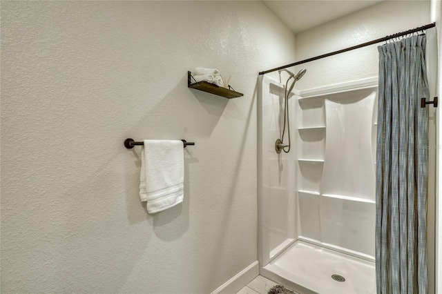 bathroom featuring walk in shower