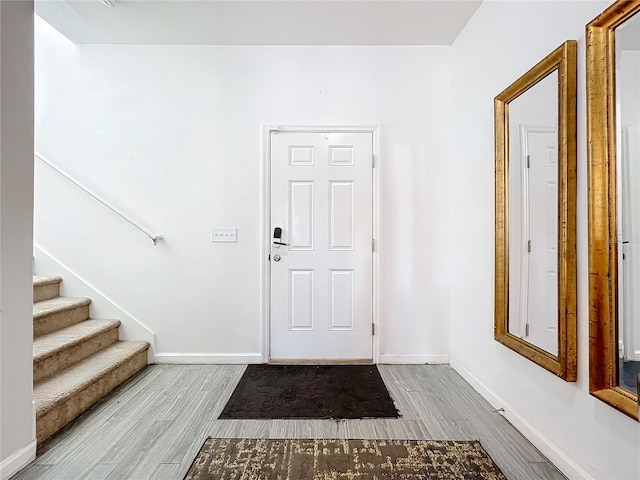 entrance foyer with light hardwood / wood-style flooring