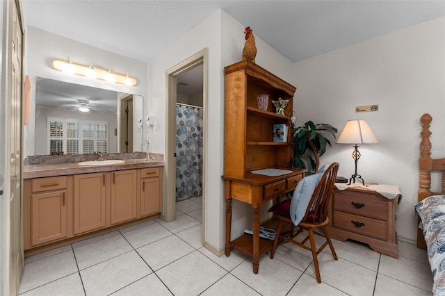 bathroom featuring vanity, ceiling fan, and tile patterned floors