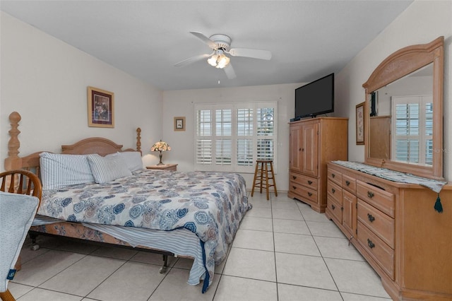 bedroom featuring ceiling fan and light tile patterned flooring