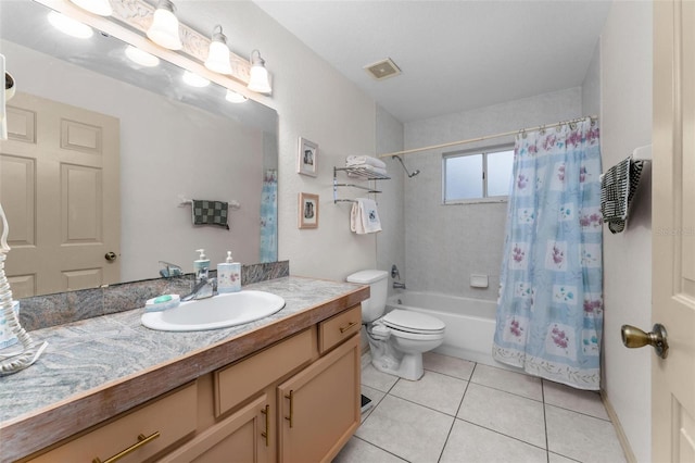 full bathroom featuring vanity, shower / tub combo, toilet, and tile patterned flooring