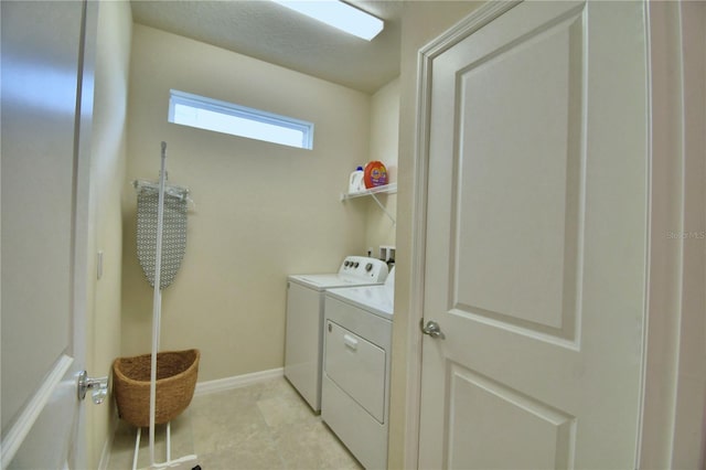 laundry area featuring washing machine and dryer