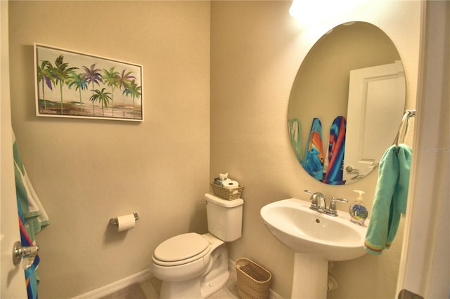 bathroom featuring toilet