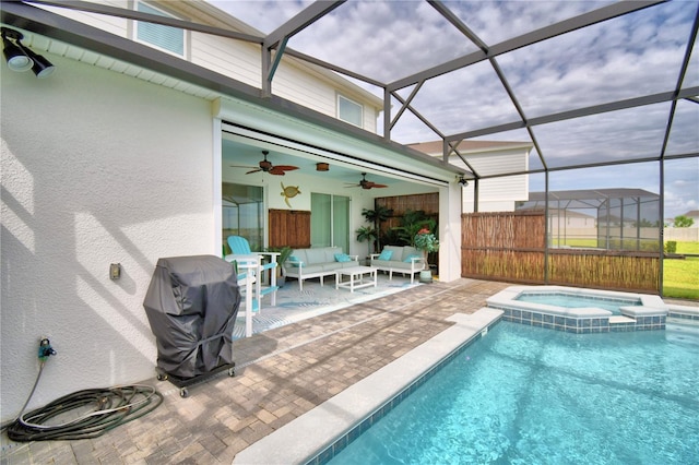 view of pool featuring ceiling fan, an in ground hot tub, a patio area, an outdoor living space, and a lanai