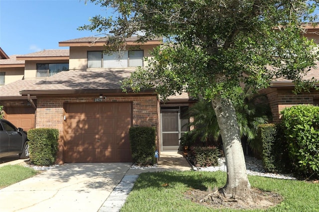 view of front of property with a garage