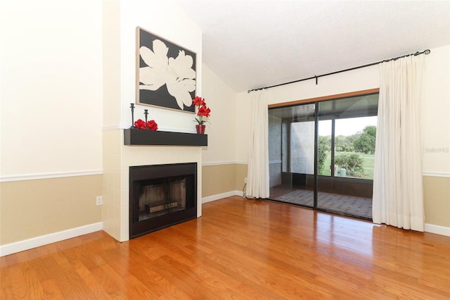 unfurnished living room with wood-type flooring