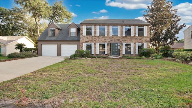 7972 Snowberry Cir, Orlando, FL 32819 - colonial inspired home with an attached garage, concrete driveway, brick siding, and a front lawn