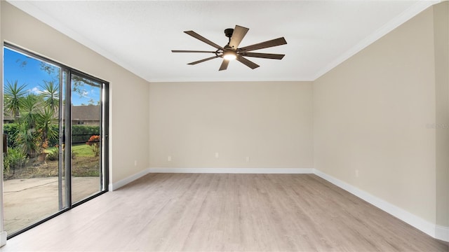 empty room with ornamental molding, ceiling fan, and light hardwood / wood-style flooring