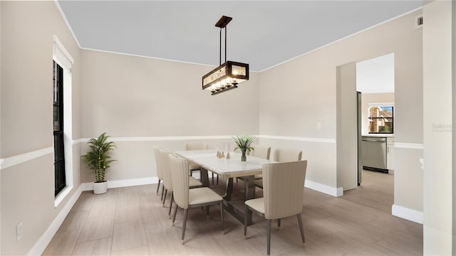 7972 Snowberry Cir, Orlando, FL 32819 - dining space featuring baseboards