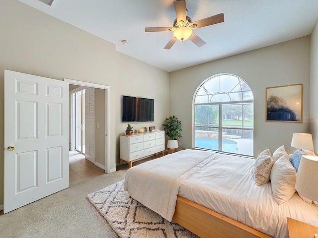 bedroom featuring ceiling fan and light carpet