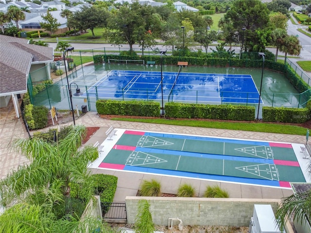 surrounding community featuring tennis court