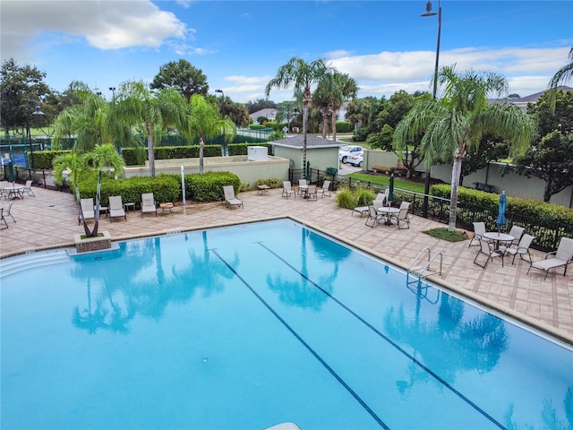 view of pool featuring a patio area