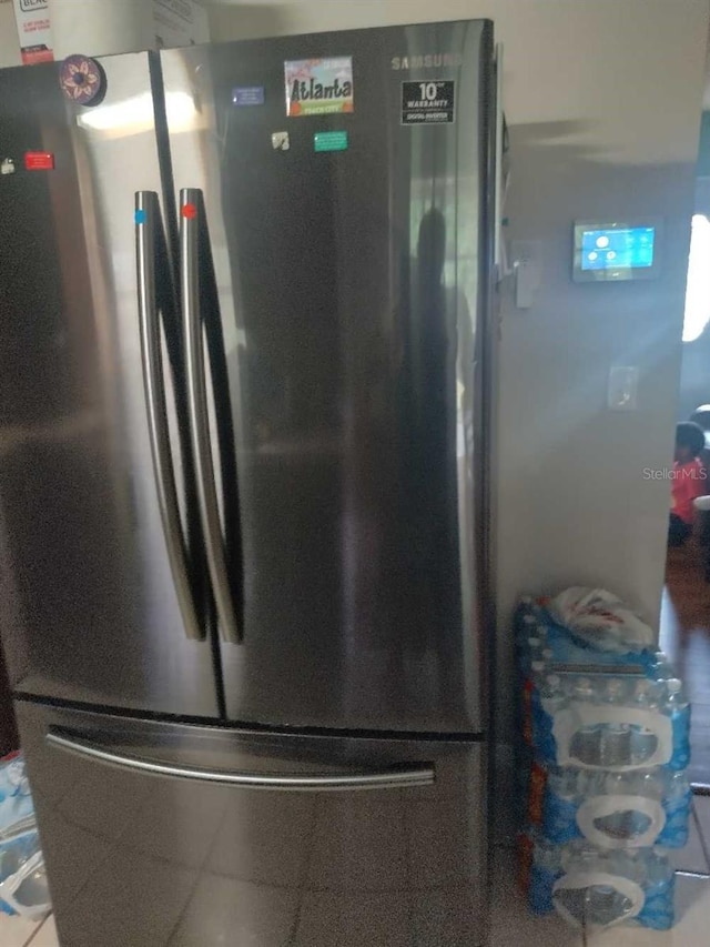 room details featuring stainless steel refrigerator