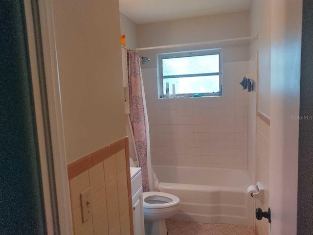 full bathroom featuring vanity, toilet, and shower / tub combo