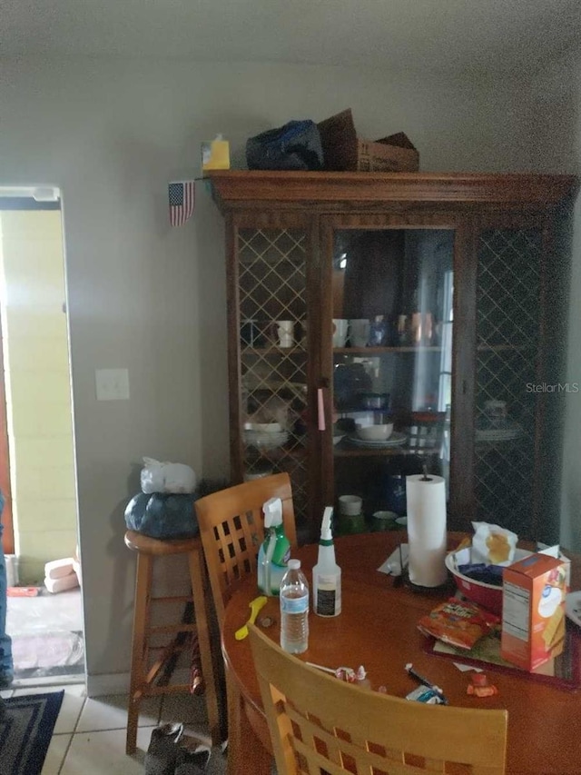 dining room with light tile patterned floors