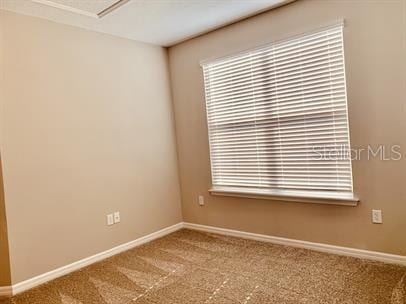 empty room with carpet floors