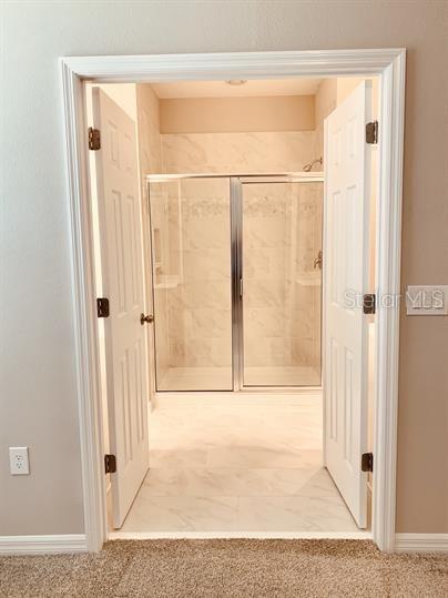 bathroom with walk in shower