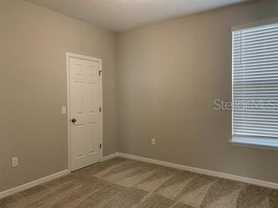 view of carpeted empty room