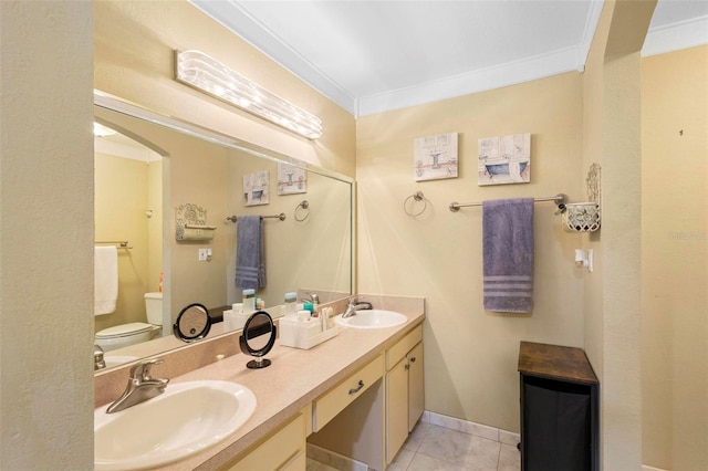 bathroom featuring ornamental molding, tile patterned flooring, vanity, and toilet