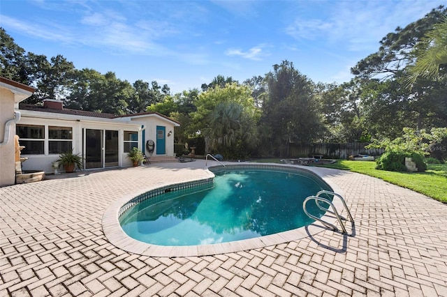 view of pool with a patio area