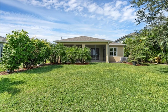 view of yard with a sunroom