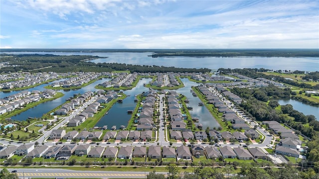 drone / aerial view with a water view