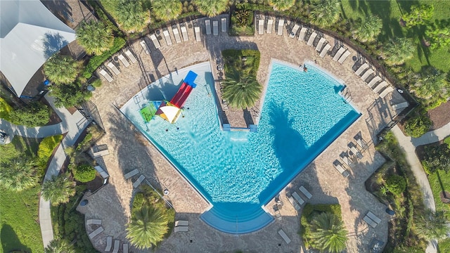 view of swimming pool featuring a patio area