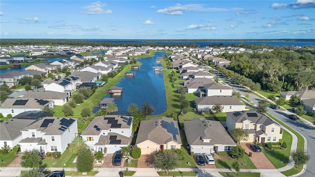 bird's eye view with a water view