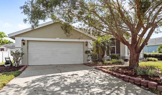 ranch-style home with a garage