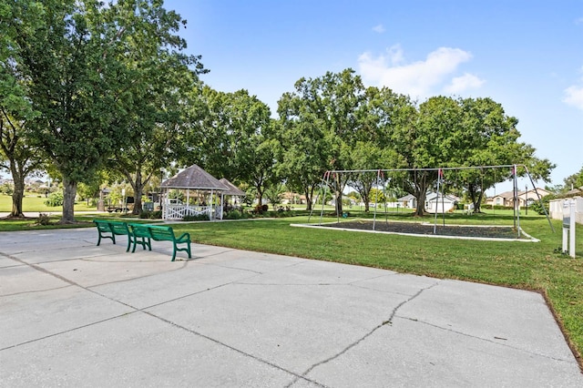 view of home's community featuring a lawn and a gazebo