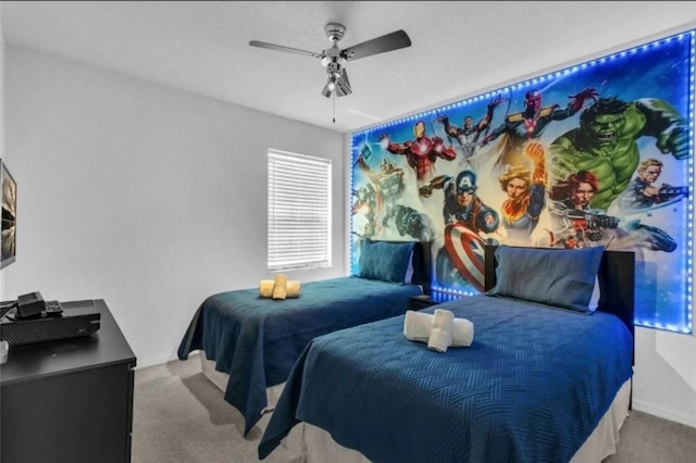 bedroom with ceiling fan and light colored carpet