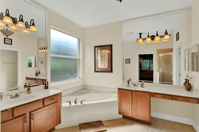 bathroom featuring vanity, shower with separate bathtub, and tile patterned floors