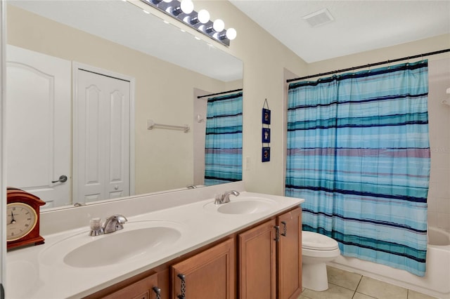 full bathroom with shower / bath combo with shower curtain, vanity, tile patterned flooring, and toilet