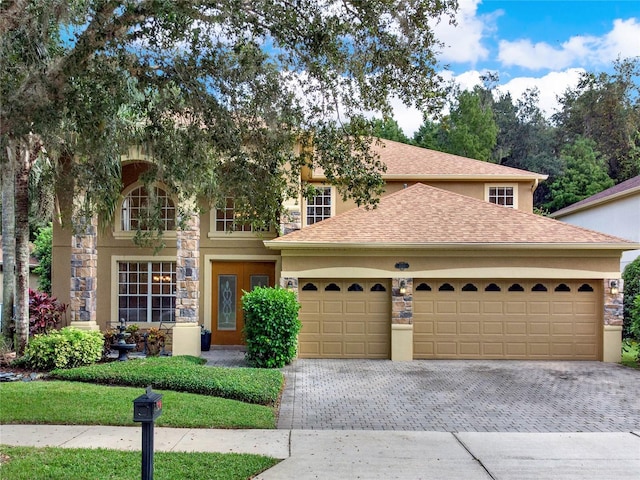 view of front of property featuring a garage