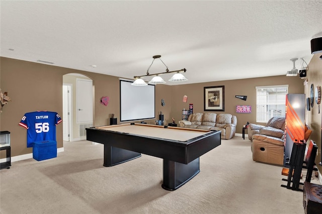 rec room with light carpet, a textured ceiling, and billiards