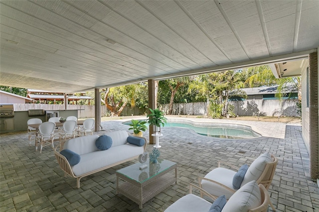 view of patio with a fenced in pool and an outdoor living space