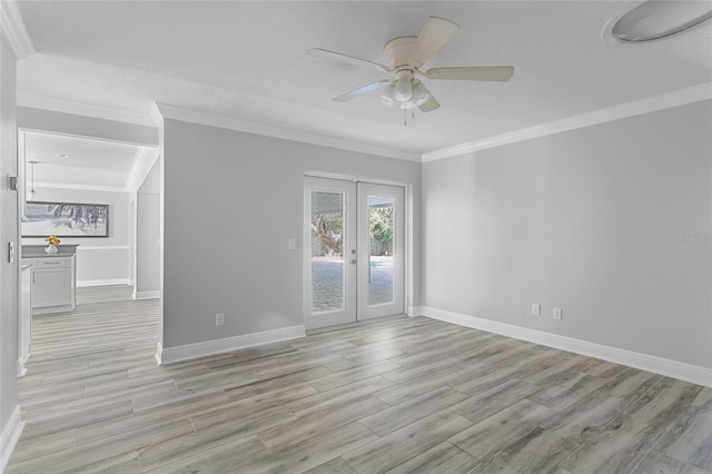 unfurnished room with ceiling fan, crown molding, light hardwood / wood-style flooring, and french doors