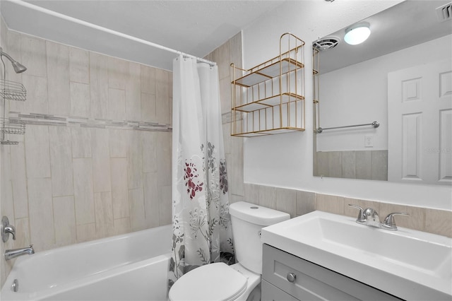 full bathroom with vanity, toilet, and shower / bathtub combination with curtain