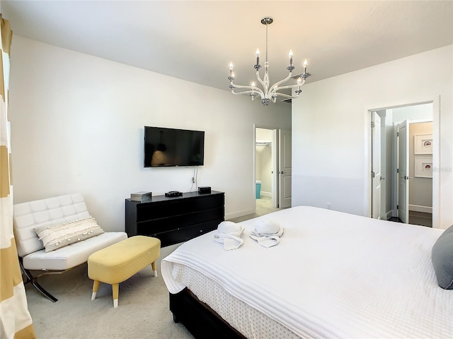 bedroom featuring a notable chandelier and carpet floors