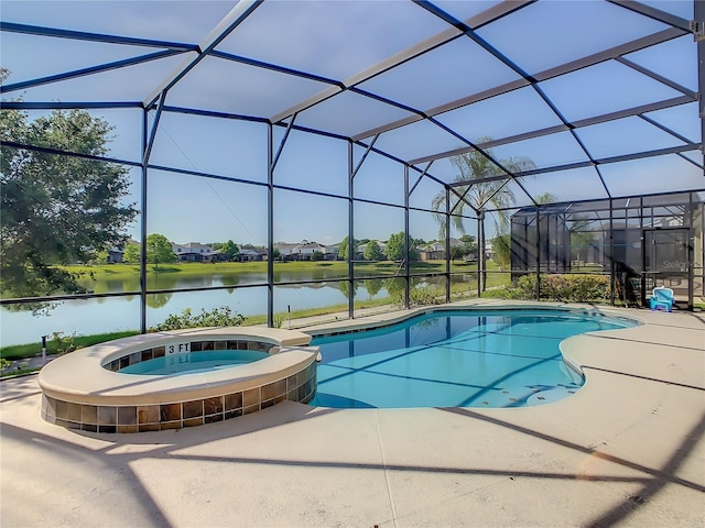 view of swimming pool with a lanai, a patio, a water view, and an in ground hot tub