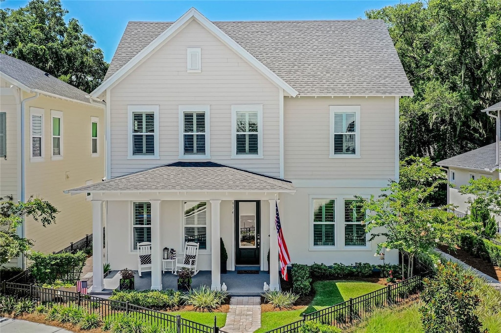 view of property with covered porch