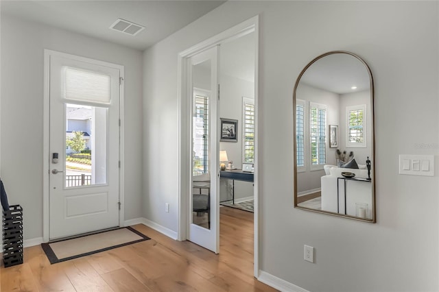 entryway with light wood-type flooring