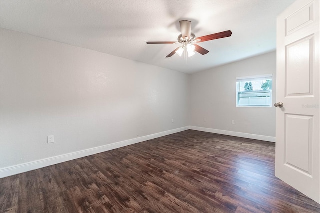 5709 Ridgeway Dr, Orlando, FL 32819 - empty room featuring ceiling fan, baseboards, lofted ceiling, and dark wood-type flooring