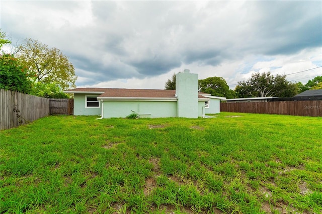 5709 Ridgeway Dr, Orlando, FL 32819 - view of yard with a fenced backyard